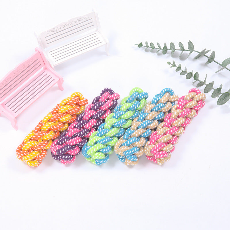Colorful cotton rope ball dog toys in yellow, purple, green, blue, and pink for interactive chewing and dental care for puppies and dogs.