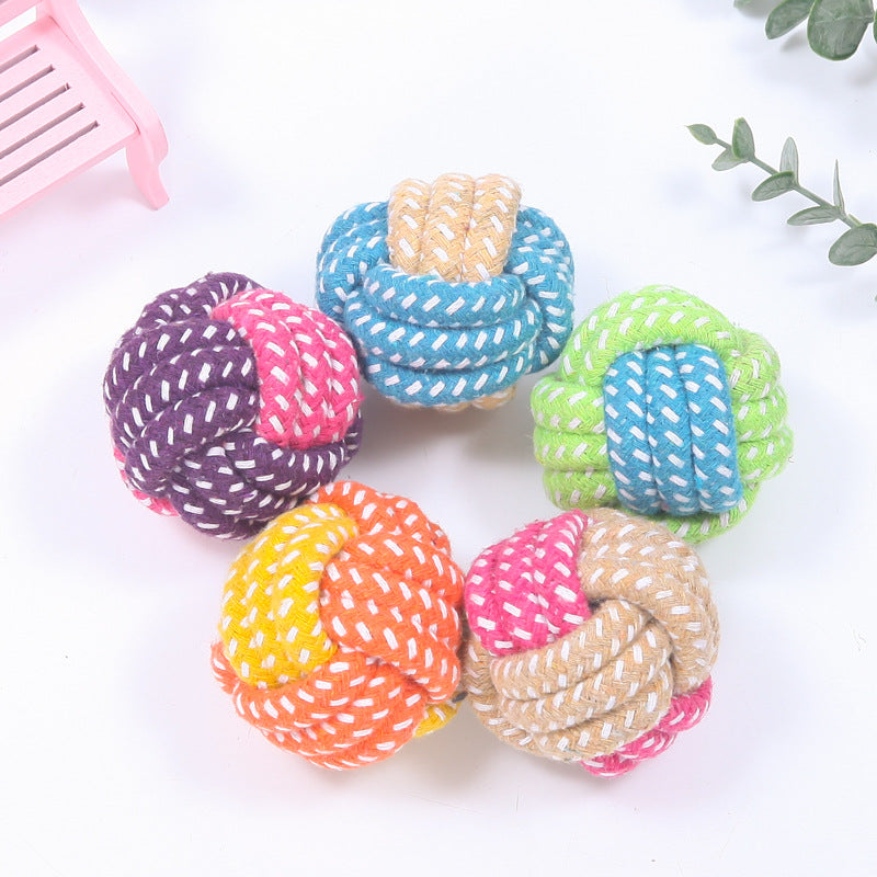 Colorful cotton rope ball dog toys for chewing and dental care, ideal for interactive play with puppies and small dogs.