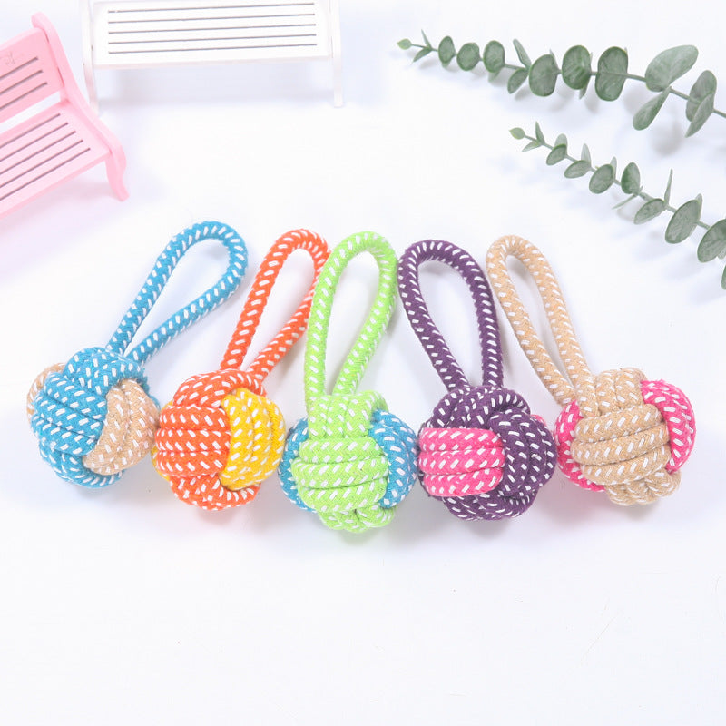 Colorful cotton rope ball dog toys with loop handles for interactive chewing and dental care, ideal for puppies and small dogs.