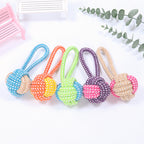 Colorful cotton rope ball dog toys with loop handles for interactive chewing and dental care, ideal for puppies and small dogs.