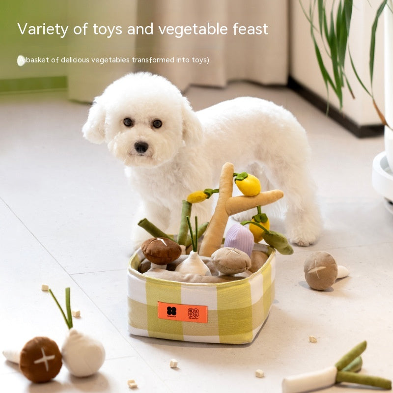 White dog with a basket of vegetable-shaped toys on a light floor.