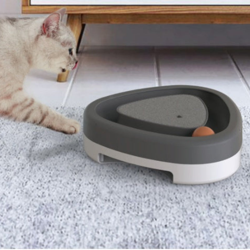 Triangle cat toy with rotating turntable on white background