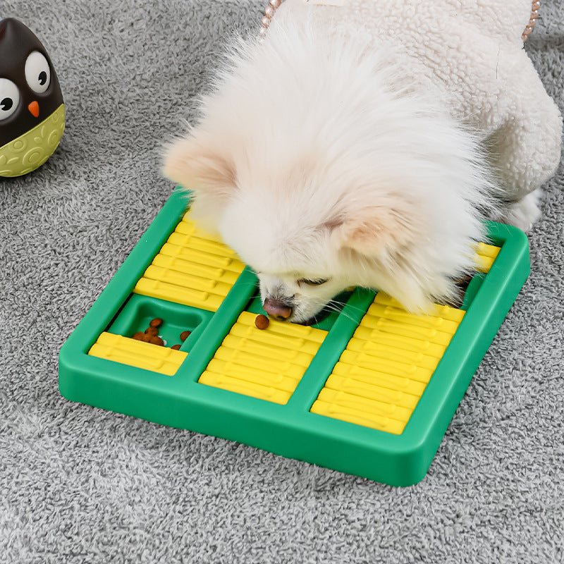 Top view of dog puzzle toy compartments and board