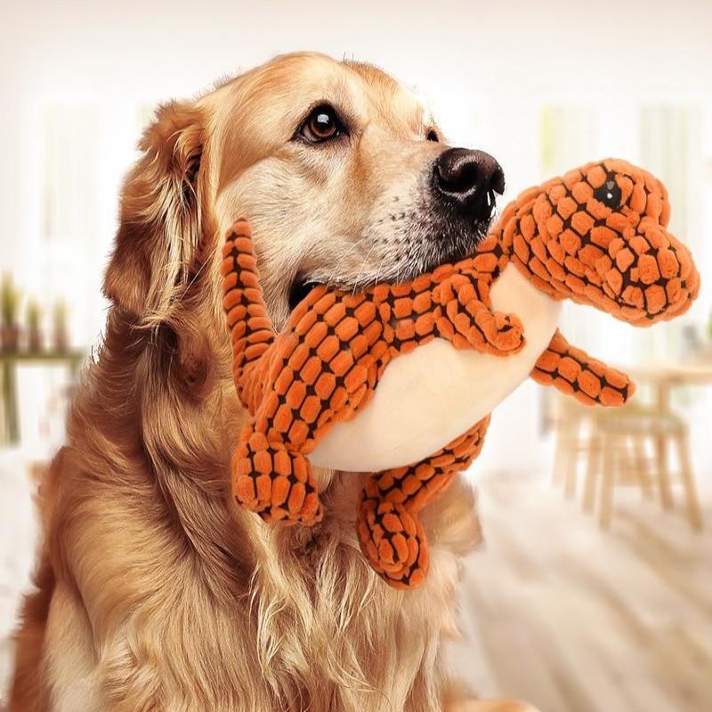 Plush dinosaur dog toy with squeaker