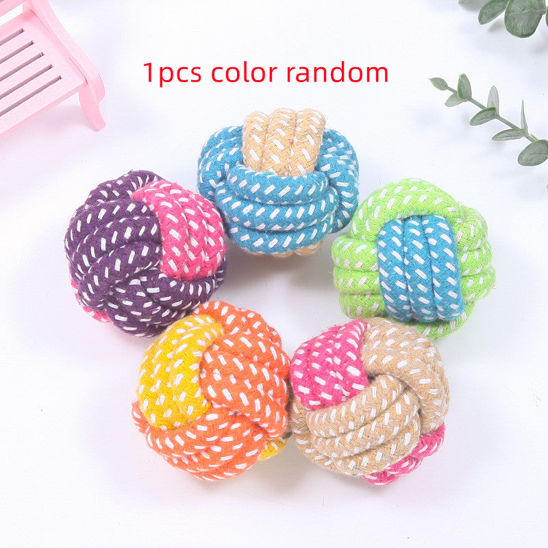 Cotton Rope Ball Dog Toy in assorted colors for interactive chewing and dental care, ideal for puppies and small dogs.