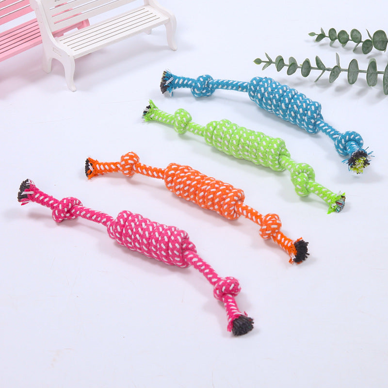 Colorful cotton rope ball dog toys in pink, orange, green, and blue for interactive chewing and dental care, ideal for puppies and small dogs.