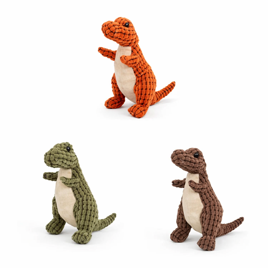 Three dinosaur-shaped toys in orange, green, and brown on a white background