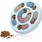Pet puzzle toy with compartments filled with treats on a white background