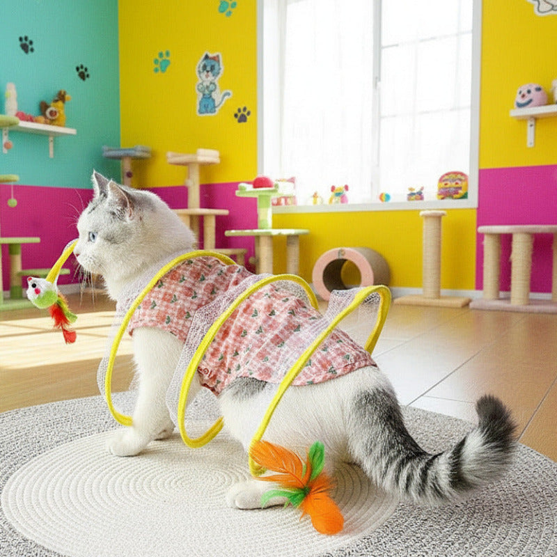 Folded cat tunnel toy with S-shaped design on indoor surface
