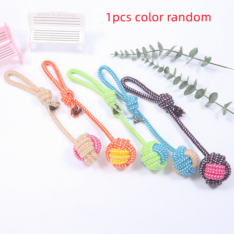Cotton Rope Ball Dog Toy in assorted colors with loop handle, ideal for interactive chewing and dental care for puppies and dogs.