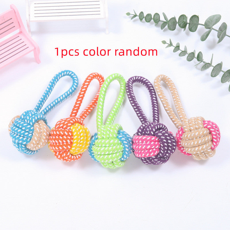 Cotton Rope Ball Dog Toy in assorted colors with loop handle for interactive chewing and dental care, ideal for puppies and small dogs.